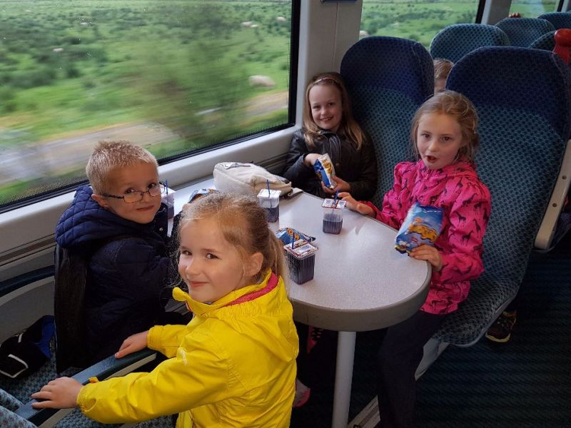 Having something to eat in the train. kelci