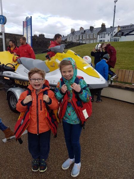 ME and Archie trying some life jackets. Zara